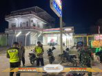 Sinergi TNI-Polri: Patroli Siskamling Tingkatkan Keamanan Desa Mulyaguna
